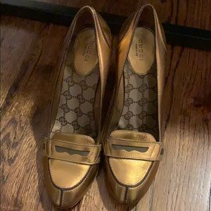 Gucci gold pumps. Classic with a sexy flare